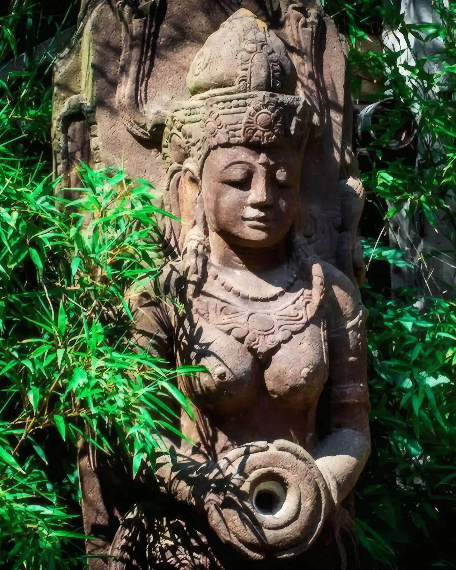HS133 Balinese statue of woman pouring water